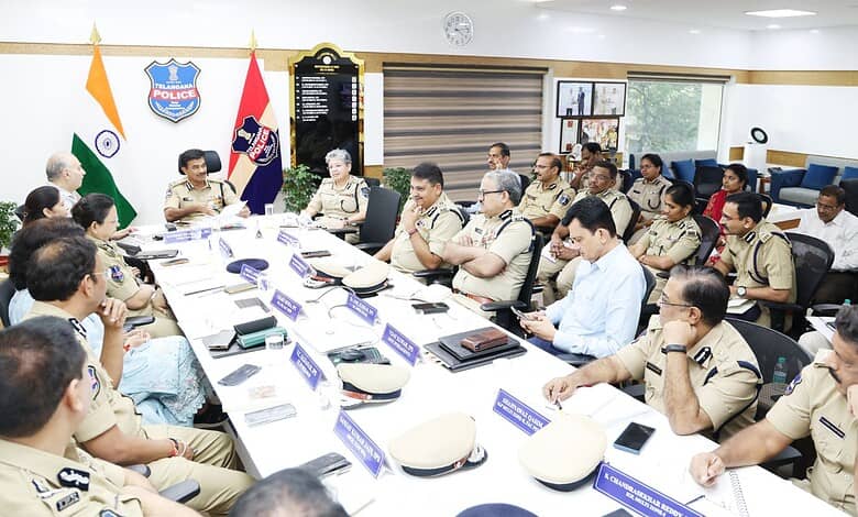 Telangana Police officials and officers in a meeting discussing reforms and cost-cutting measures.