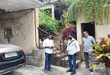 HMSSB officials collect fine from a person for wasting water