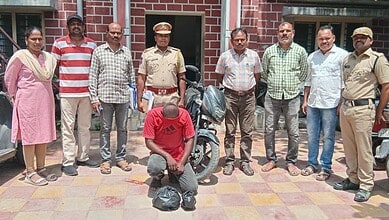 Police and officials with seized ganja and suspect in Hyderabad, drug peddling case.The Dhoolpet Excise officials with accused Akash Singh