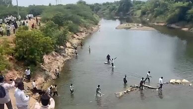 Farmers enter Jurala Canal in Gadwal