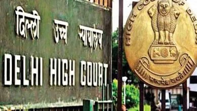 Delhi High Court sign and emblem in the image.