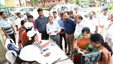 Telangana CEO urges voters to register as deadline approaches, with officials and citizens at a polling站.