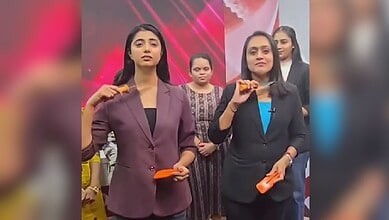 Women anchors accepted trishuls from a VHP leader and made a throat-slitting expression