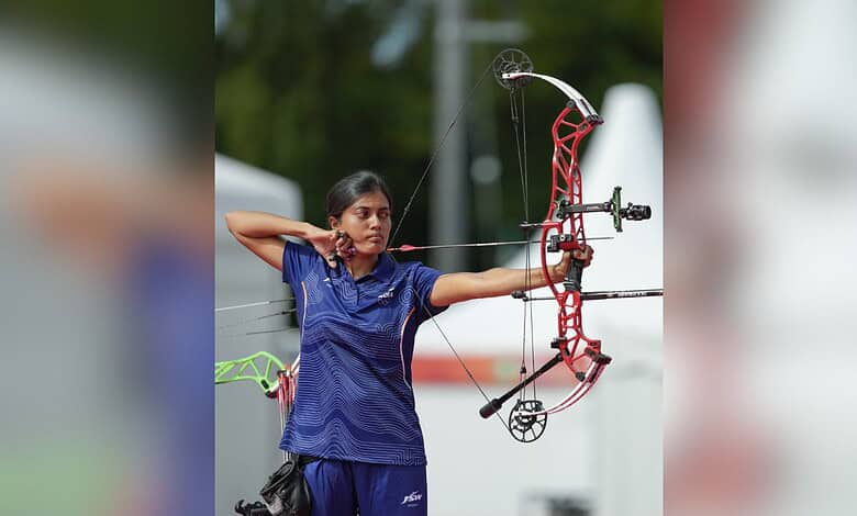 Telangana archer aiming with a bow during a competition at the Asian Games.