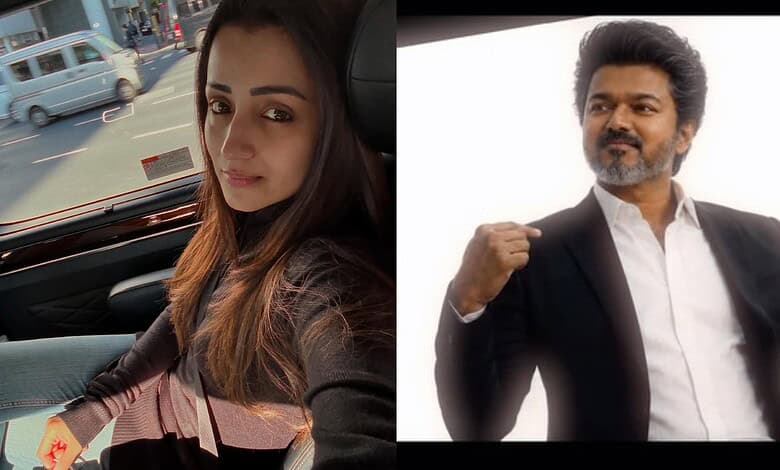 Thalapathy Vijay and Trisha together in a promotional event or photoshoot.