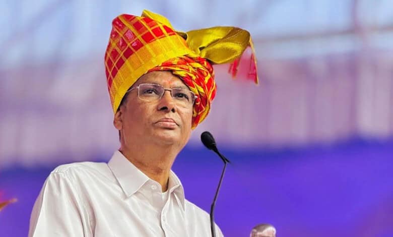 K. Chandrashekar Rao wearing a traditional turban at a public event.