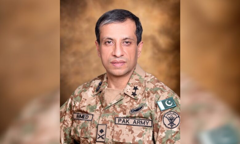 Pakistani military officer in uniform with Pakistan and military insignia.
