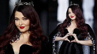 Aishwarya Rai Bachchan wearing a black gown and crown at Paris Fashion Week 2026.