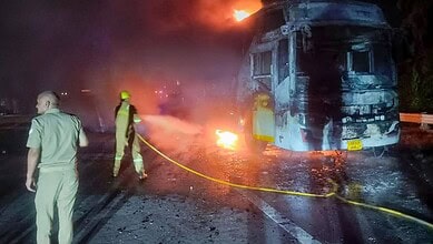Noida: Firefighters at the site after a sleeper bus caught fire on the Yamuna Expressway in the Greater Noida area, killing nine passengers, in Noida, early Thursday, Sept. 24, 2026. (PTI Photo)