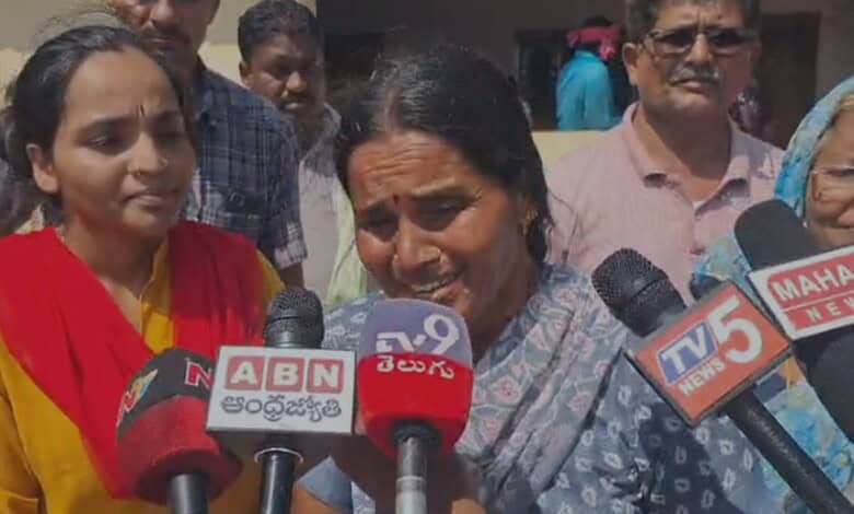 A woman cries afte being duped in the chit fund scam