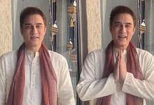 Faissal Khan in traditional attire with hands folded in greeting during Janmashtami celebrations.