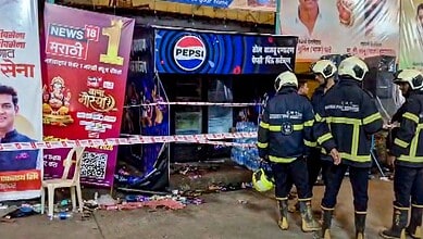 Mumbai: People gather after an electrocution incident near a Ganapati pandal, at Lalbaug area, in Mumbai, Sunday, Sept. 20, 2026. Two persons, including an eight-year-old girl, were killed and several others were injured in the incident. (PTI Photo)