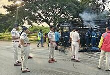Emergency responders and police at the scene of a fire accident in Mahabubnagar.