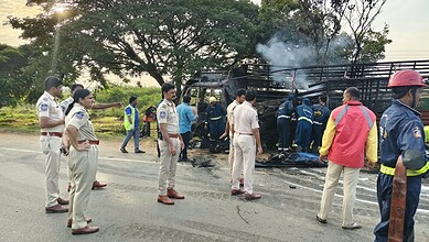 Emergency responders and police at the scene of a fire accident in Mahabubnagar.