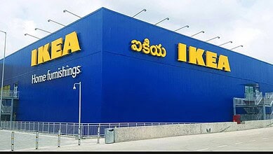 IKEA store exterior with blue facade and yellow signage in Hyderabad, India.