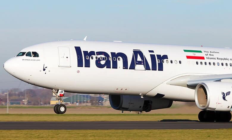 IranAir aircraft on runway with Iran flag and logo visible.