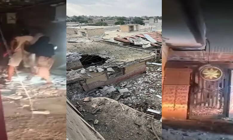 People inspecting damage after US strike in Iran, with destroyed buildings and debris.