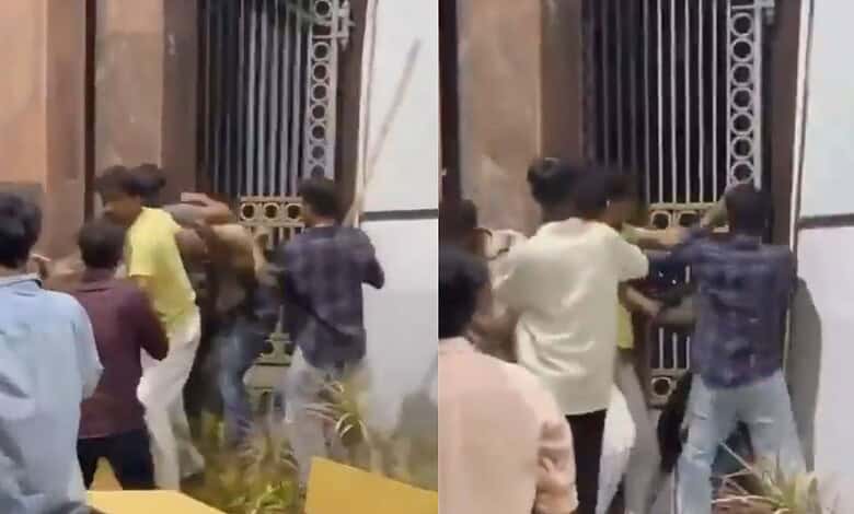 Students clash outside JNTU campus during a heated altercation.