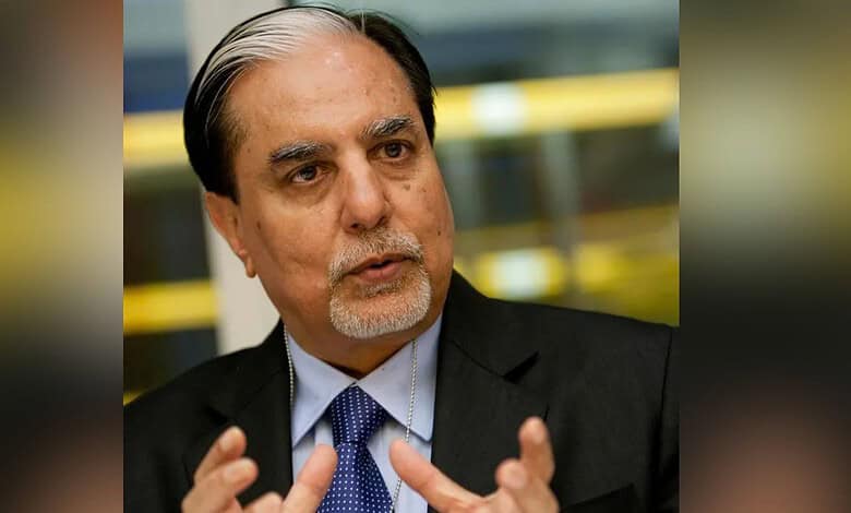 Subhash Chandra speaking at a press conference or event.