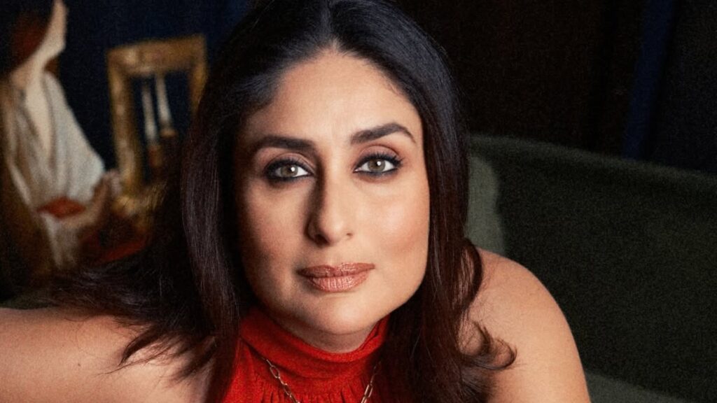 Close-up of Kareena Kapoor with makeup and long dark hair, wearing a red top.