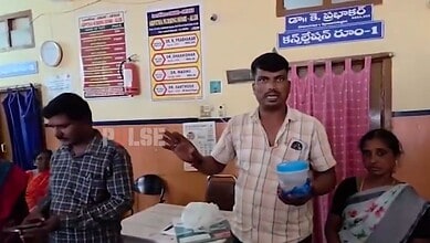 Medical staff in Telangana clinic discussing patient care with a woman patient present.