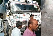Hyderabad RTC bus damaged after collision with lorry, several people present at scene.