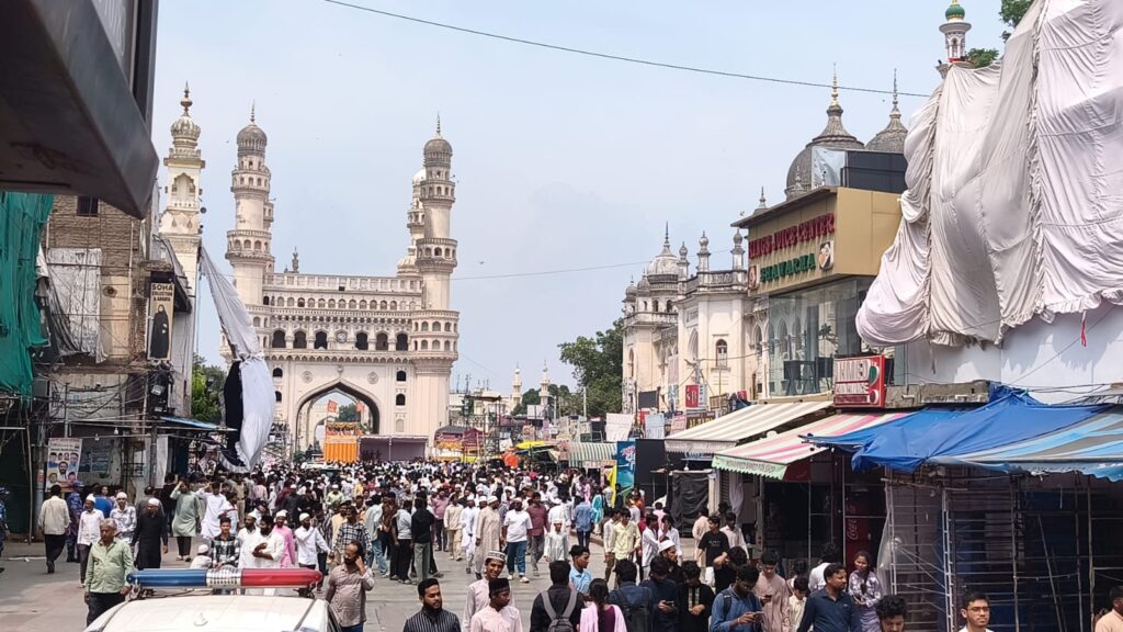 Large crowd gathered at Hyderabad's Makkah Masjid for Friday prayer under high security.