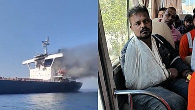 Ship on fire after attack near Oman, with smoke rising from the vessel.