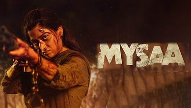 Rashmika Mandanna as fierce tribal woman in ‘Mysaa’ teaser, holding a weapon with intense expression.