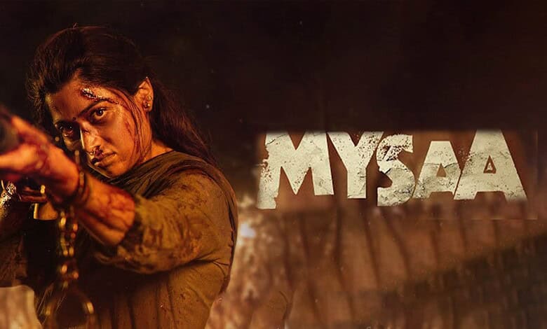 Rashmika Mandanna as fierce tribal woman in ‘Mysaa’ teaser, holding a weapon with intense expression.