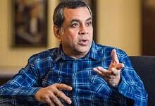 Paresh Rawal speaking during an interview or discussion in a casual setting.