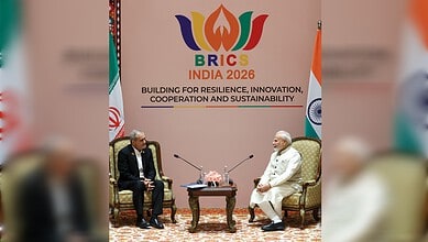 Indian Prime Minister Narendra Modi and Iranian Foreign Minister Pezeshkian discuss at BRICS 2026 summit.