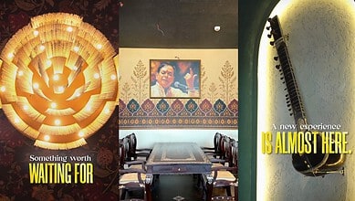 Interior of a spiritual dining restaurant with a large menorah and a framed picture of a spiritual leader.