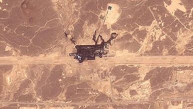 Aerial satellite image showing pipeline infrastructure in a desert landscape in Saudi Arabia.