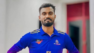 Sivarasa Anojan wearing a blue sports jersey.