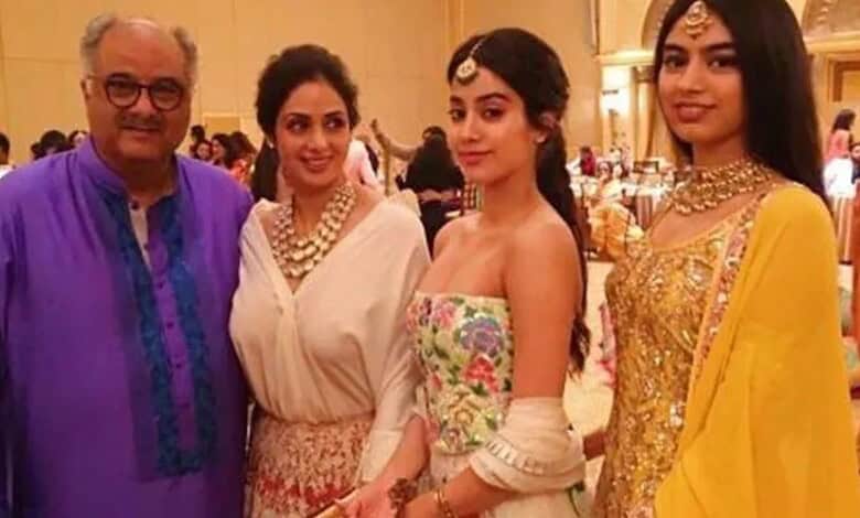 Four people, including Boney Kapoor and two women, dressed in traditional Indian attire at an event.