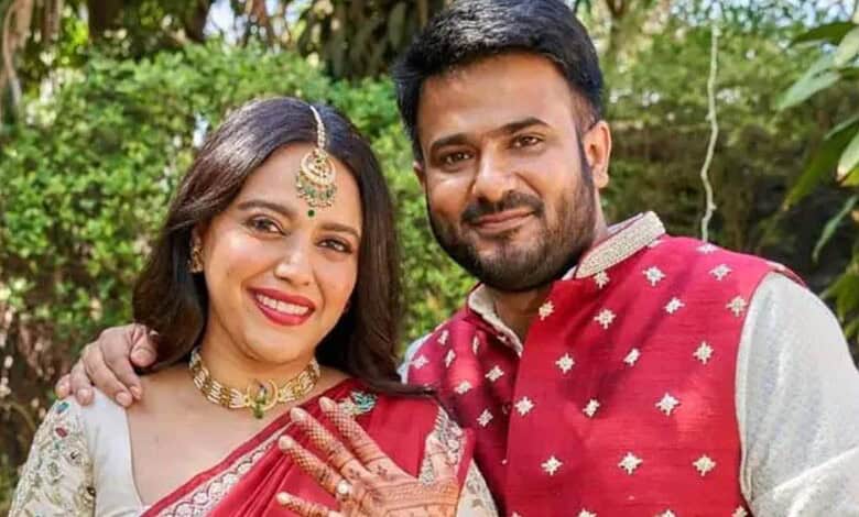 Swara Bhasker and her partner smiling outdoors in traditional attire.