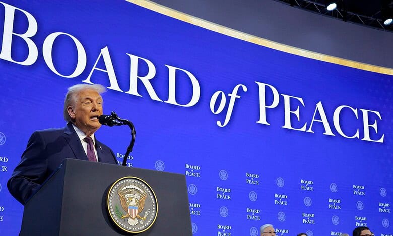 Donald Trump speaking at the Board of Peace event with a blue backdrop and official seal.