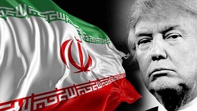Iranian flag beside Donald Trump’s portrait.