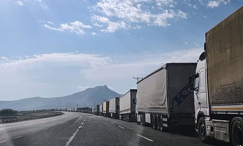 Long line of trucks waiting at the Turkiye-Iran border amid blockade.