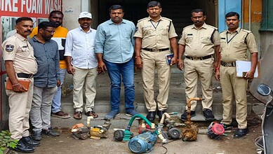 HMWSSB officials with seized illegal water motors in KPHB during crackdown.