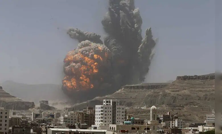 Massive explosion and smoke rising over cityscape after attack on telecom towers in Yemen.