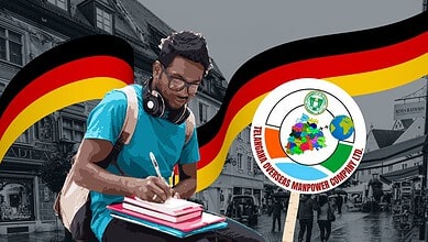 Young man protesting in Germany with flags and a logo of a workers' union.