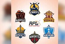 Indian archery teams and league logos at the Archery Premier League event.