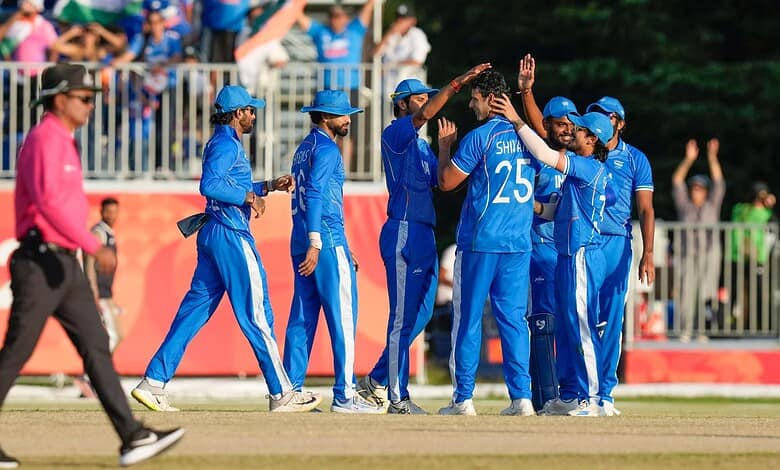 Indian women's cricket team celebrates a wicket at the Asian Games.