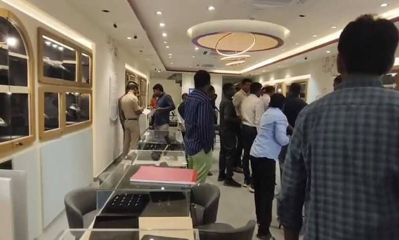 Customers browsing jewellery inside CaratLane store in Medipally.
