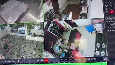 CCTV footage shows individuals in a gated community, possibly involved in suspicious activity.