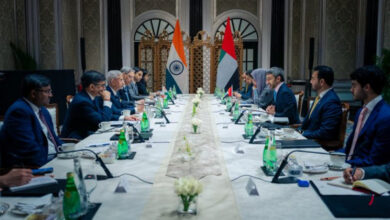 EAM Jaishankar and UAE officials meet for economic discussions in a grand hall.