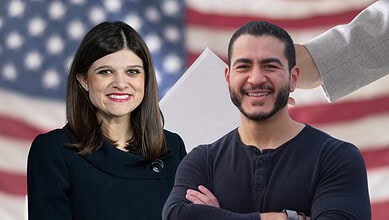 Two smiling individuals in front of an American flag backdrop.