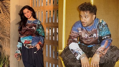 Hania Aamir and Asim Azhar in casual attire at an indoor setting.